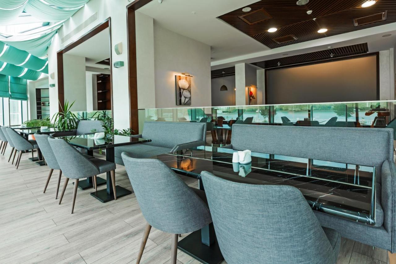 Dedeman Oskemen Tavros Hotel Ust-Kamenogorsk Exterior photo The interior of the lounge