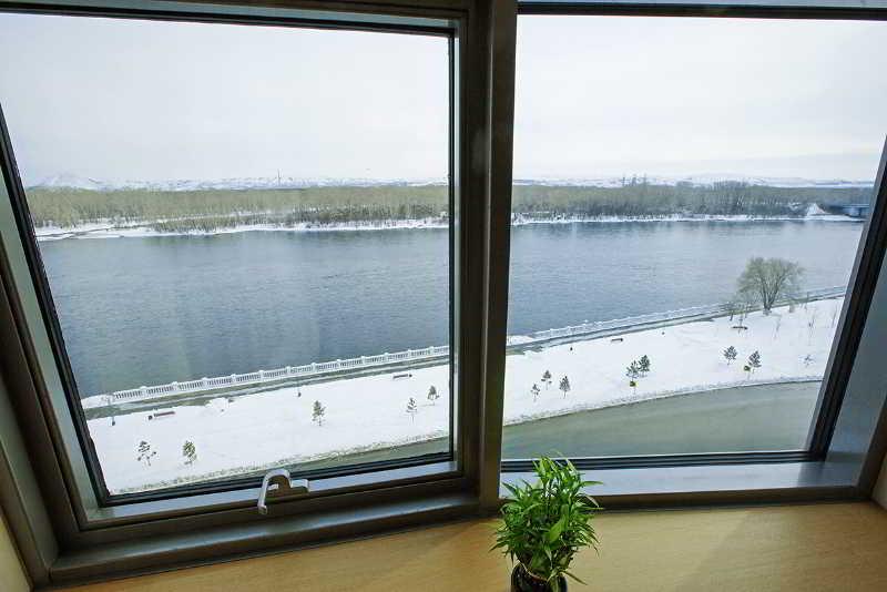 Dedeman Oskemen Tavros Hotel Ust-Kamenogorsk Exterior photo View of the river from the hotel