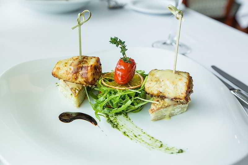 Dedeman Oskemen Tavros Hotel Ust-Kamenogorsk Exterior photo Canapé