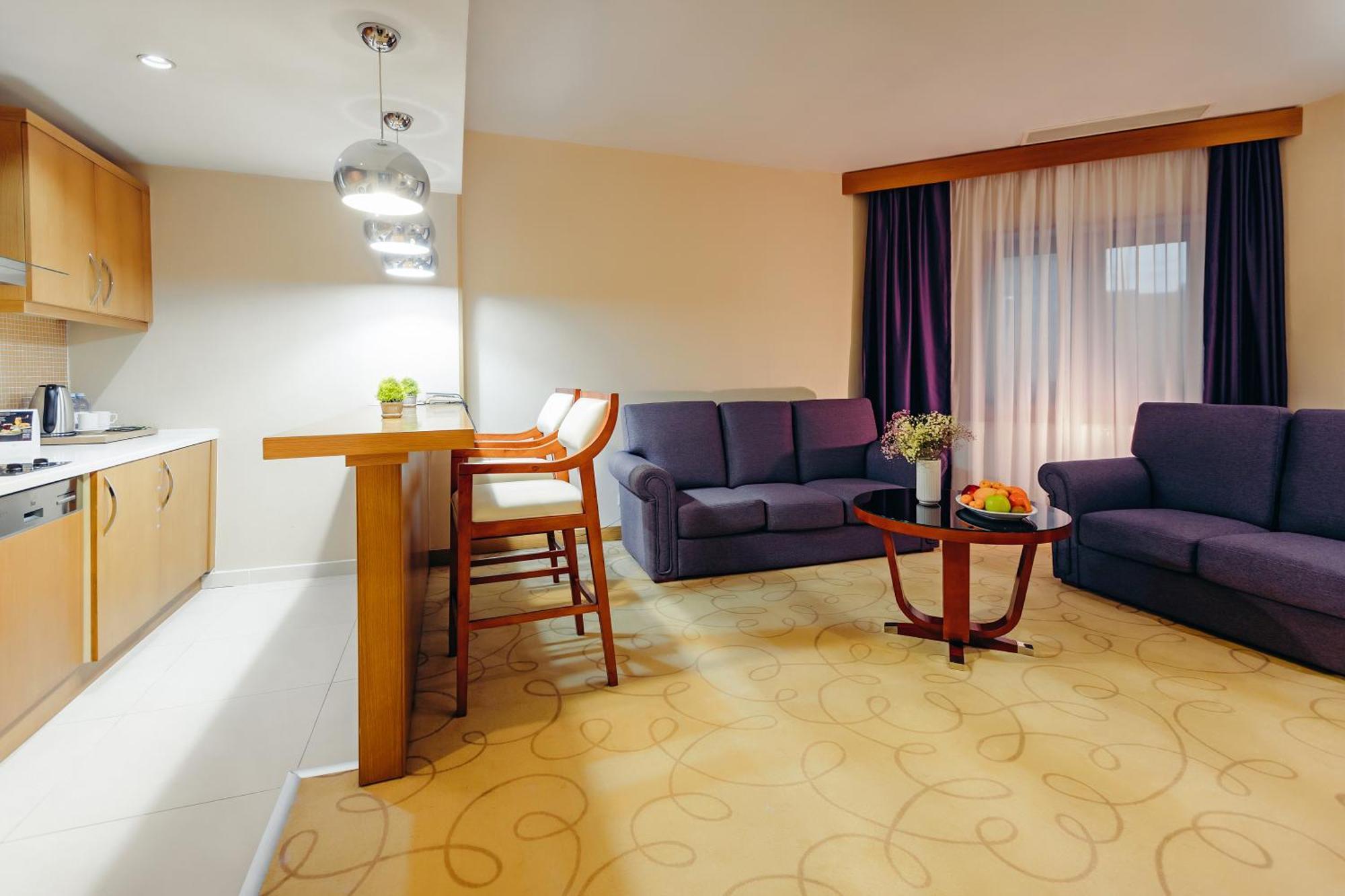 Dedeman Oskemen Tavros Hotel Ust-Kamenogorsk Exterior photo A typical apartment