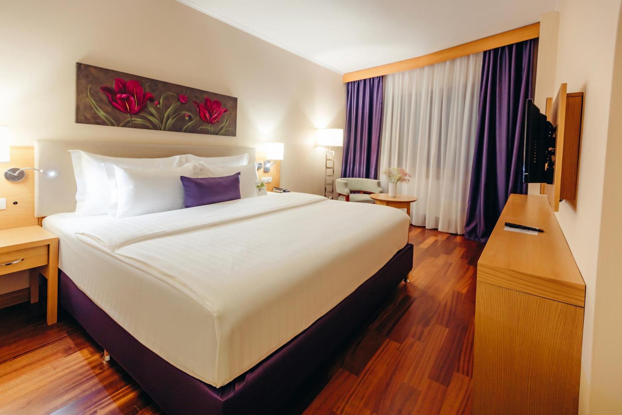 Dedeman Oskemen Tavros Hotel Ust-Kamenogorsk Exterior photo A room at the hotel
