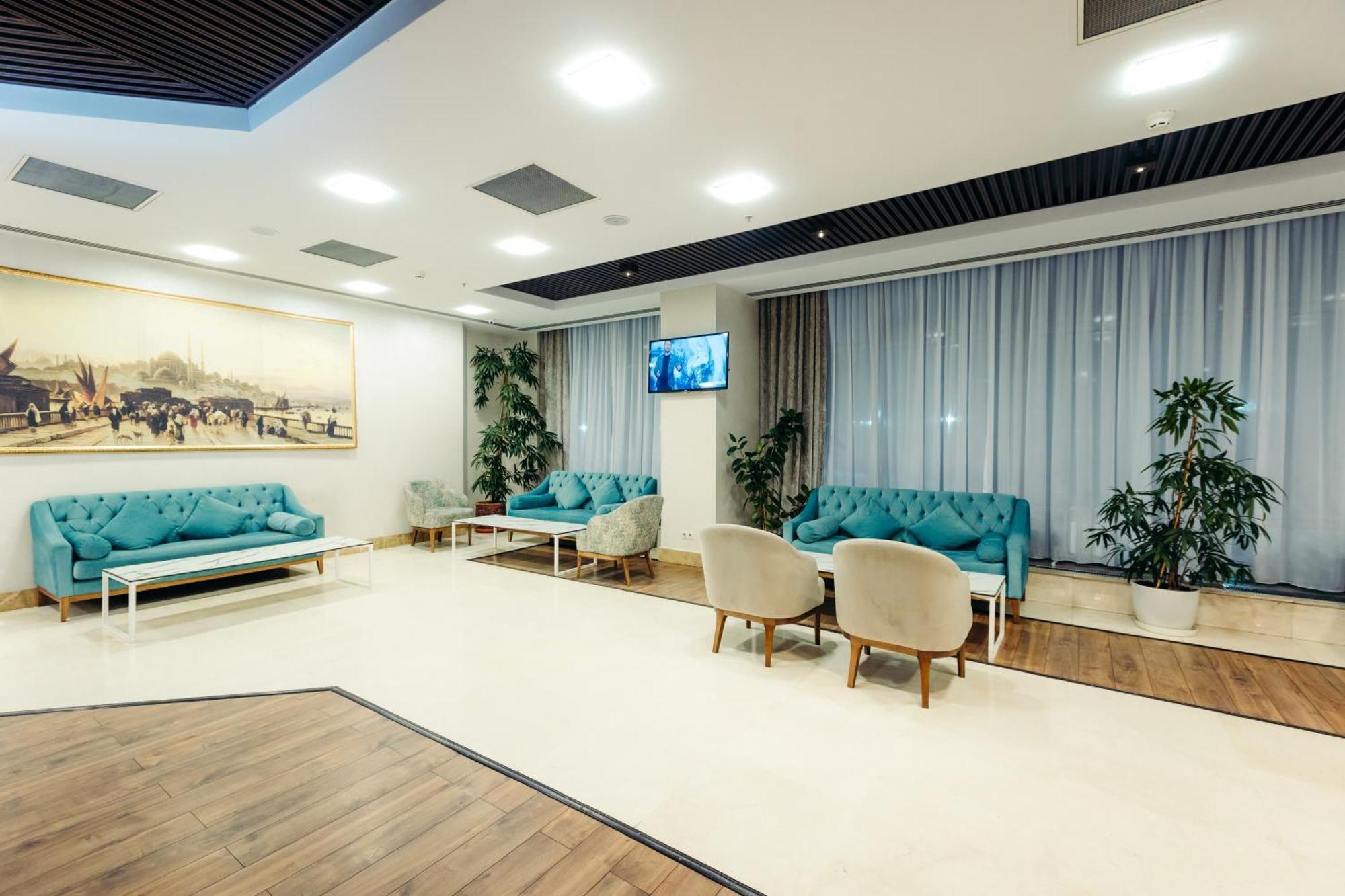 Dedeman Oskemen Tavros Hotel Ust-Kamenogorsk Exterior photo The lobby of the university library
